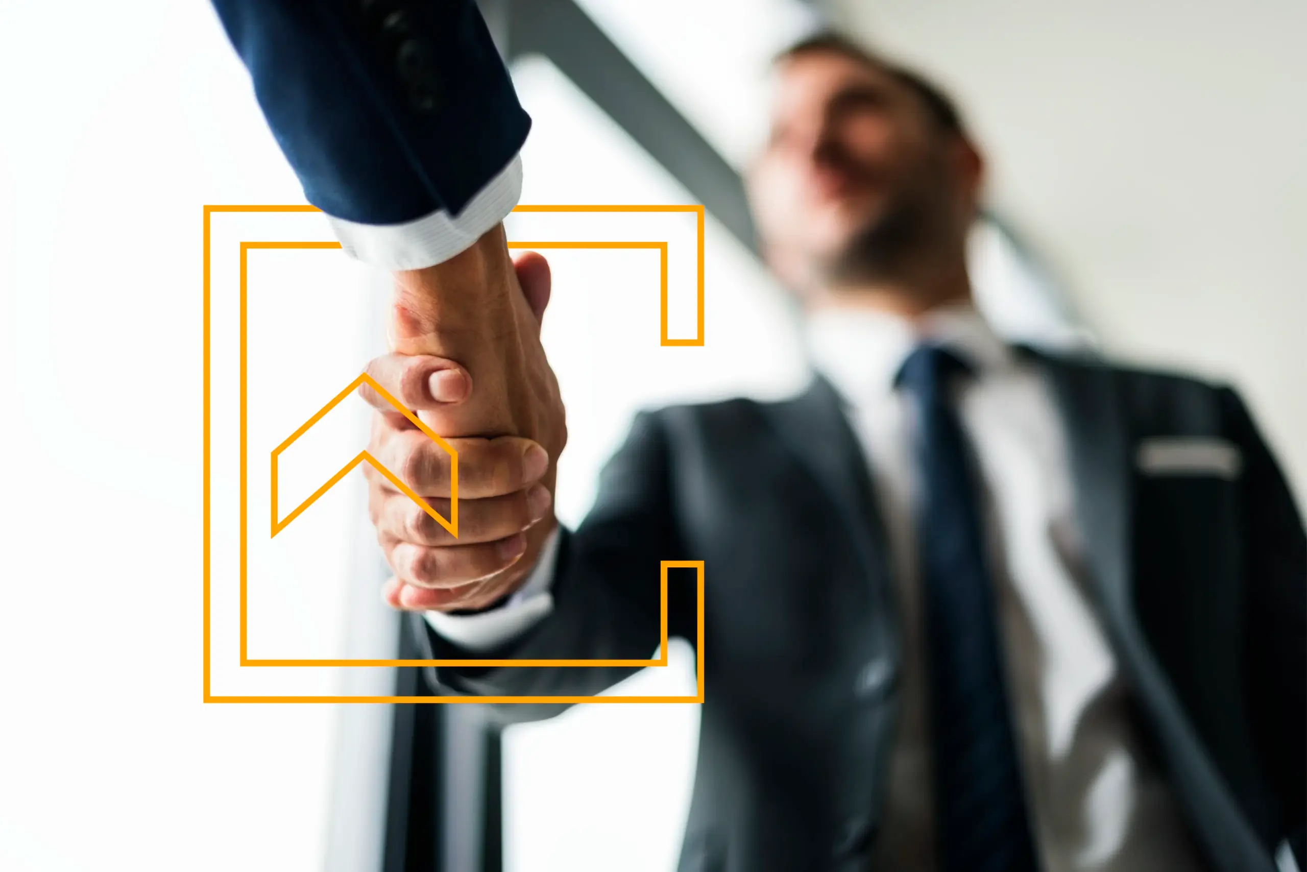 Aperto de mãos entre empresários em ambiente corporativo